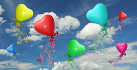 bunte Luftballonherzen am Himmel/10479022